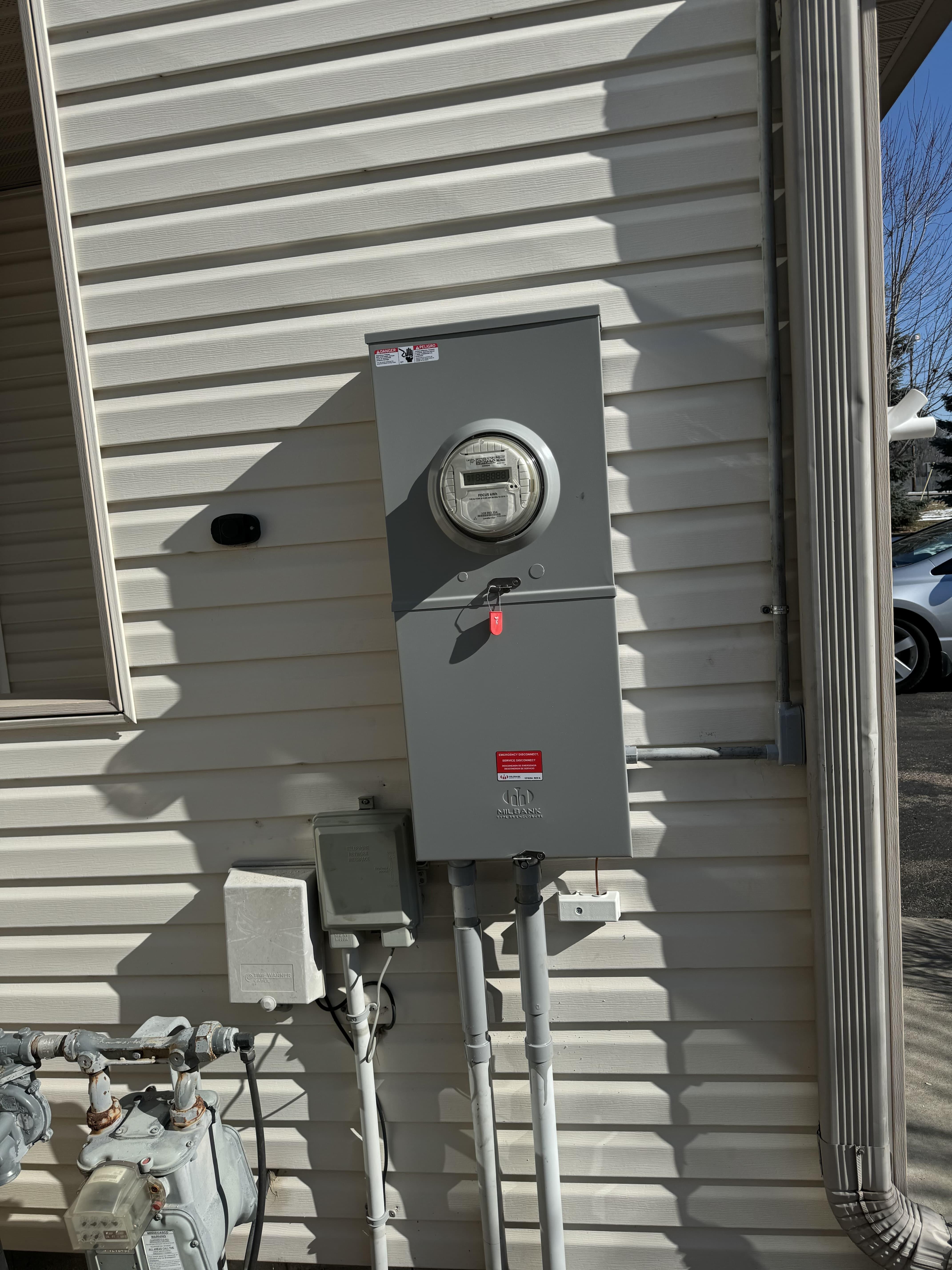 Service panel on exterior wall